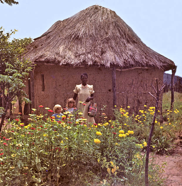 Nancy, sister Kathy, and village woman near Chissamba, 1949